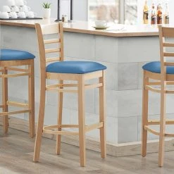 Budget ๐ Lancaster Table & Seating Natural Finish Wooden Ladder Back Bar Height Chair With Blue Padded Seat โญ