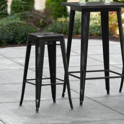 Brand new ???? LT&S Alloy Series Lancaster Table & Seating Alloy Series Distressed Black Stackable Metal Indoor / Outdoor Industrial Barstool With Drain Hole Seat ⌛