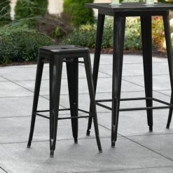 Brand new 🔔 LT&S Alloy Series Lancaster Table & Seating Alloy Series Distressed Black Stackable Metal Indoor / Outdoor Industrial Barstool With Drain Hole Seat ⌛