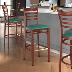Best deal ๐ LT&S Spartan Series Lancaster Table & Seating Spartan Series Bar Height Metal Ladder Back Chair With Mahogany Wood Grain Finish And Green Vinyl Seat ๐คฉ