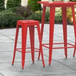 Outlet 🥰 LT&S Alloy Series Lancaster Table & Seating Alloy Series Red Stackable Metal Indoor / Outdoor Industrial Barstool With Drain Hole Seat 🔥