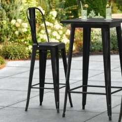 Discount 🌟 LT&S Alloy Series Lancaster Table & Seating Alloy Series Distressed Black Metal Indoor / Outdoor Industrial Cafe Barstool With Vertical Slat Back And Drain Hole Seat 😍