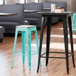 New 👏 LT&S Alloy Series Lancaster Table & Seating Alloy Series Distressed Seafoam Stackable Metal Indoor Industrial Barstool With Gray Wood Seat 🌟