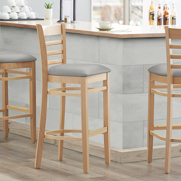 Best Pirce ๐ Lancaster Table & Seating Natural Finish Wooden Ladder Back Bar Height Chair With Light Gray Padded Seat โญ