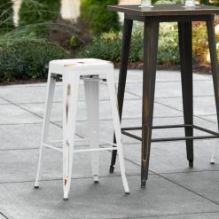 Cheap 😉 LT&S Alloy Series Lancaster Table & Seating Alloy Series Distressed White Stackable Metal Indoor / Outdoor Industrial Barstool With Drain Hole Seat ✔️