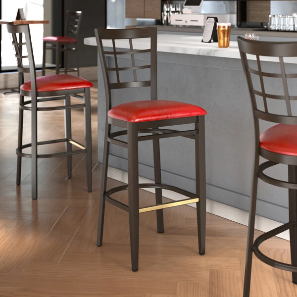 Discount 🤩 LT&S Spartan Series Lancaster Table & Seating Spartan Series Bar Height Metal Window Back Chair With Walnut Wood Grain Finish And Red Vinyl Seat 🎉