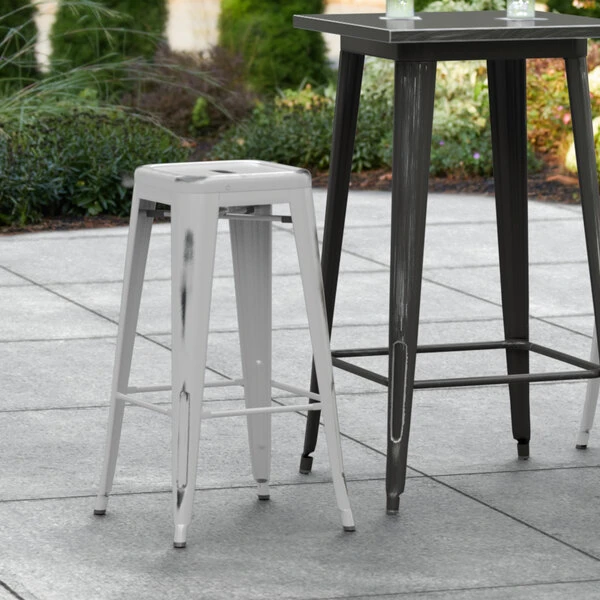 Buy โญ LT&S Alloy Series Lancaster Table & Seating Alloy Series Distressed Silver Stackable Metal Indoor / Outdoor Industrial Barstool With Drain Hole Seat โ๏ธ