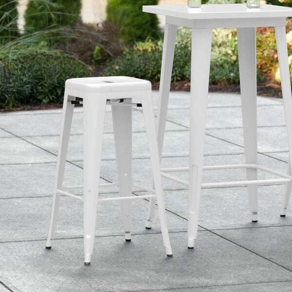 Outlet 👏 LT&S Alloy Series Lancaster Table & Seating Alloy Series White Stackable Metal Indoor / Outdoor Industrial Barstool With Drain Hole Seat ✨