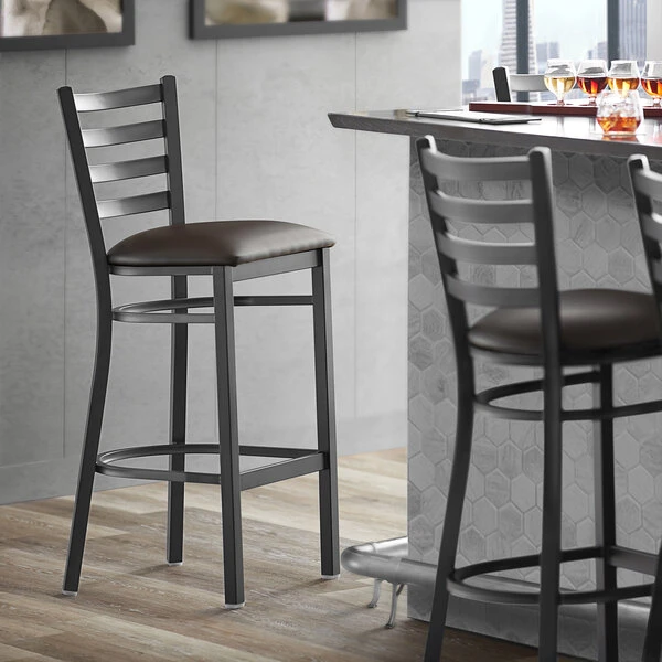 Hot Sale 👏 Lancaster Table & Seating Black Frame Ladder Back Bar Height Chair With Dark Brown Padded Seat 👏